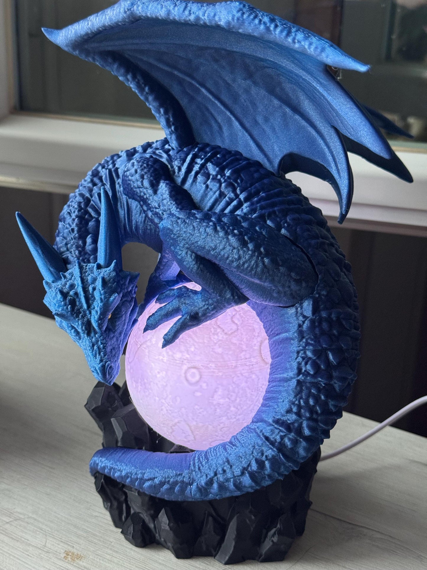 Eclipse Dragon Lamp - Dragons among books | home lighting | bookcase decoration