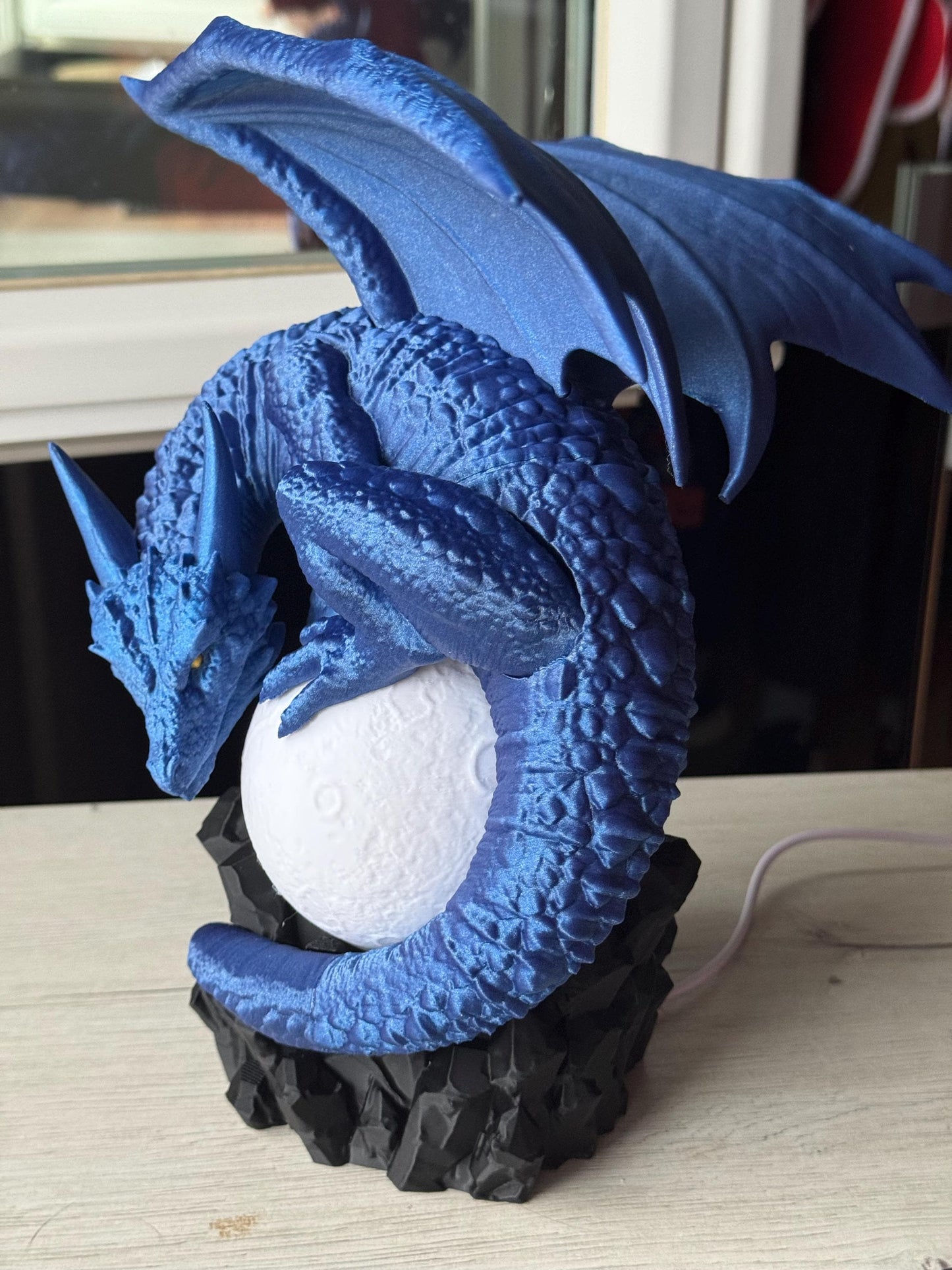 Eclipse Dragon Lamp - Dragons among books | home lighting | bookcase decoration