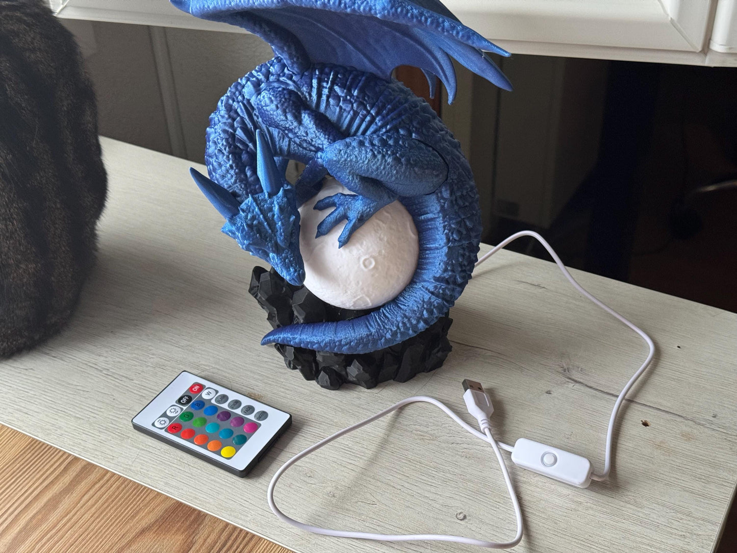 Eclipse Dragon Lamp - Dragons among books | home lighting | bookcase decoration
